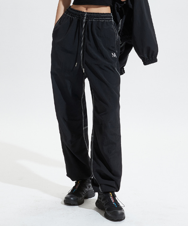 NOI578 stitch nylon pants (black)